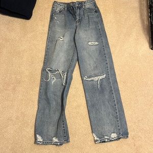 light blue slightly ripped jeans